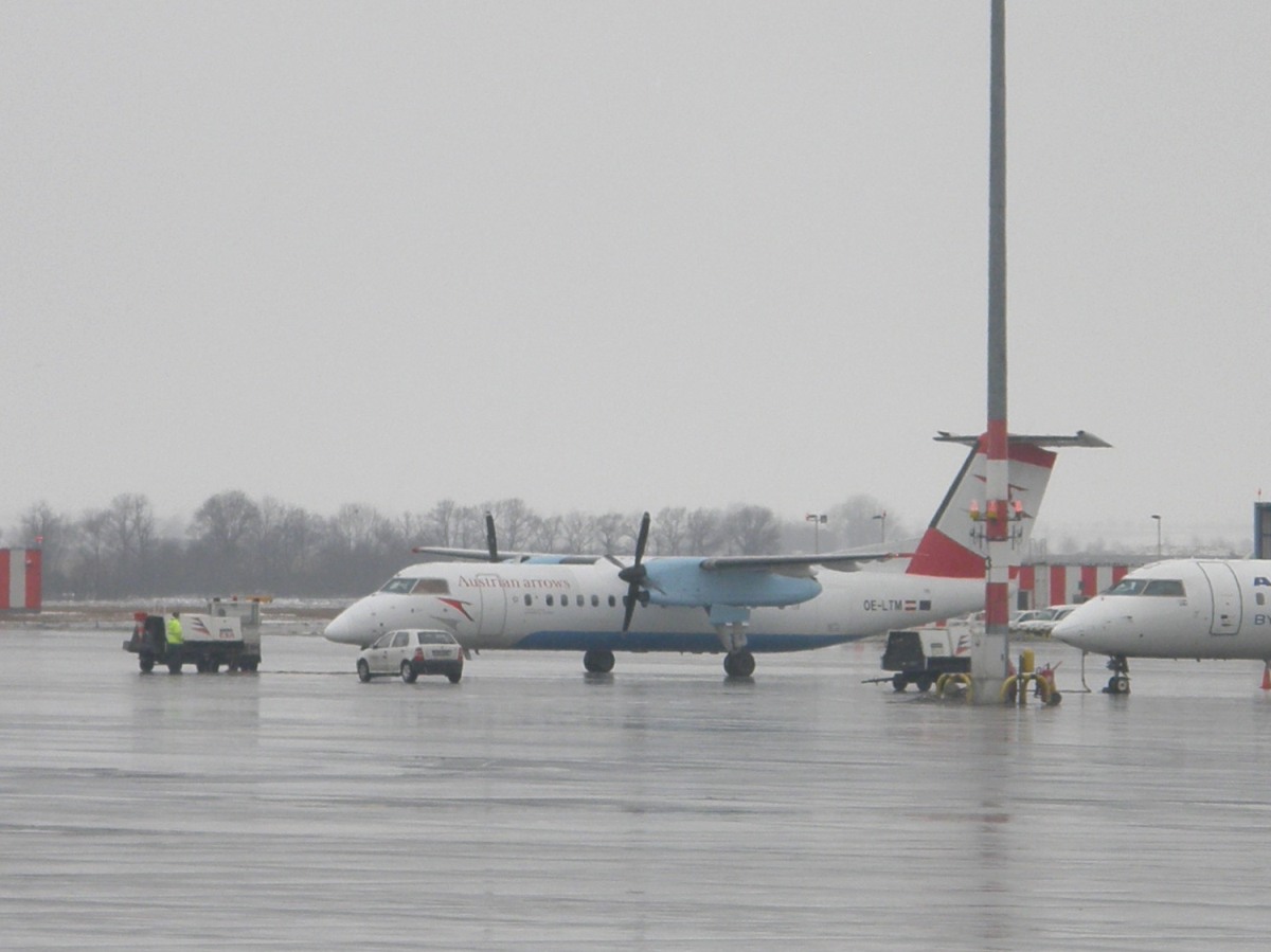 DHC-8-314Q Dash 8 Austrian Arrows (Tyrolean Airways) OE-LTM Prague_Ruzyne February_23_2009